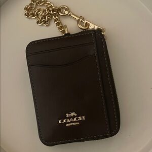 Coach Dark Brown Leather Card Case with Gold Chain
Make me a offer!